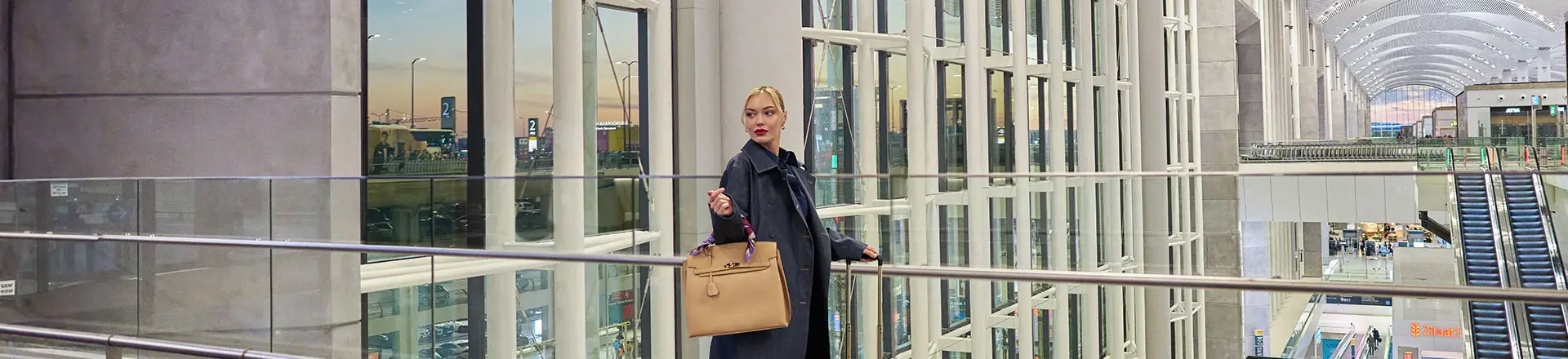 a passenger walking towards her flight at new istanbul airport