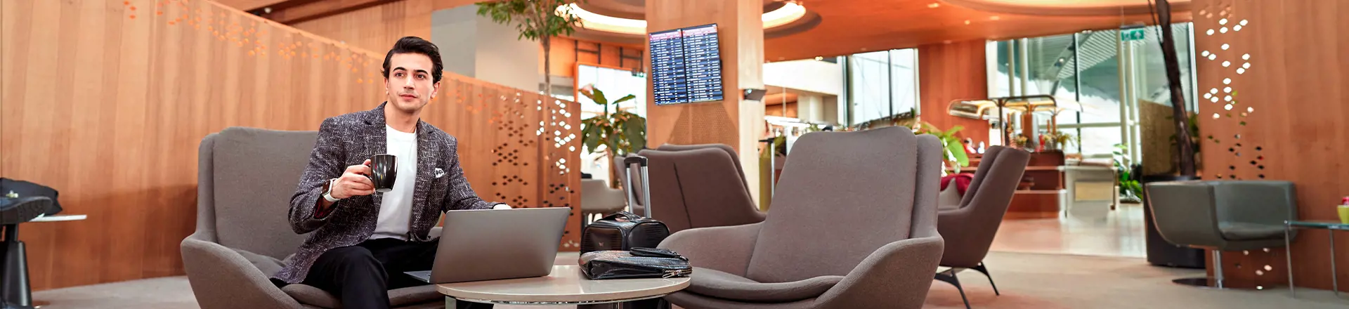 a passenger resting in the comfortable chairs of istanbul airport 